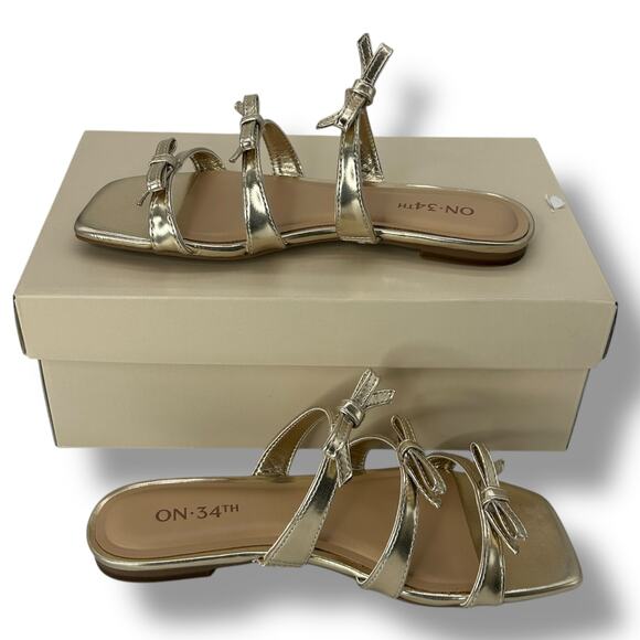 NEW ON 34th Gold Strappy Bow Sandals Size 5 Flat Square Toe FLAW - Picture 1 of 8